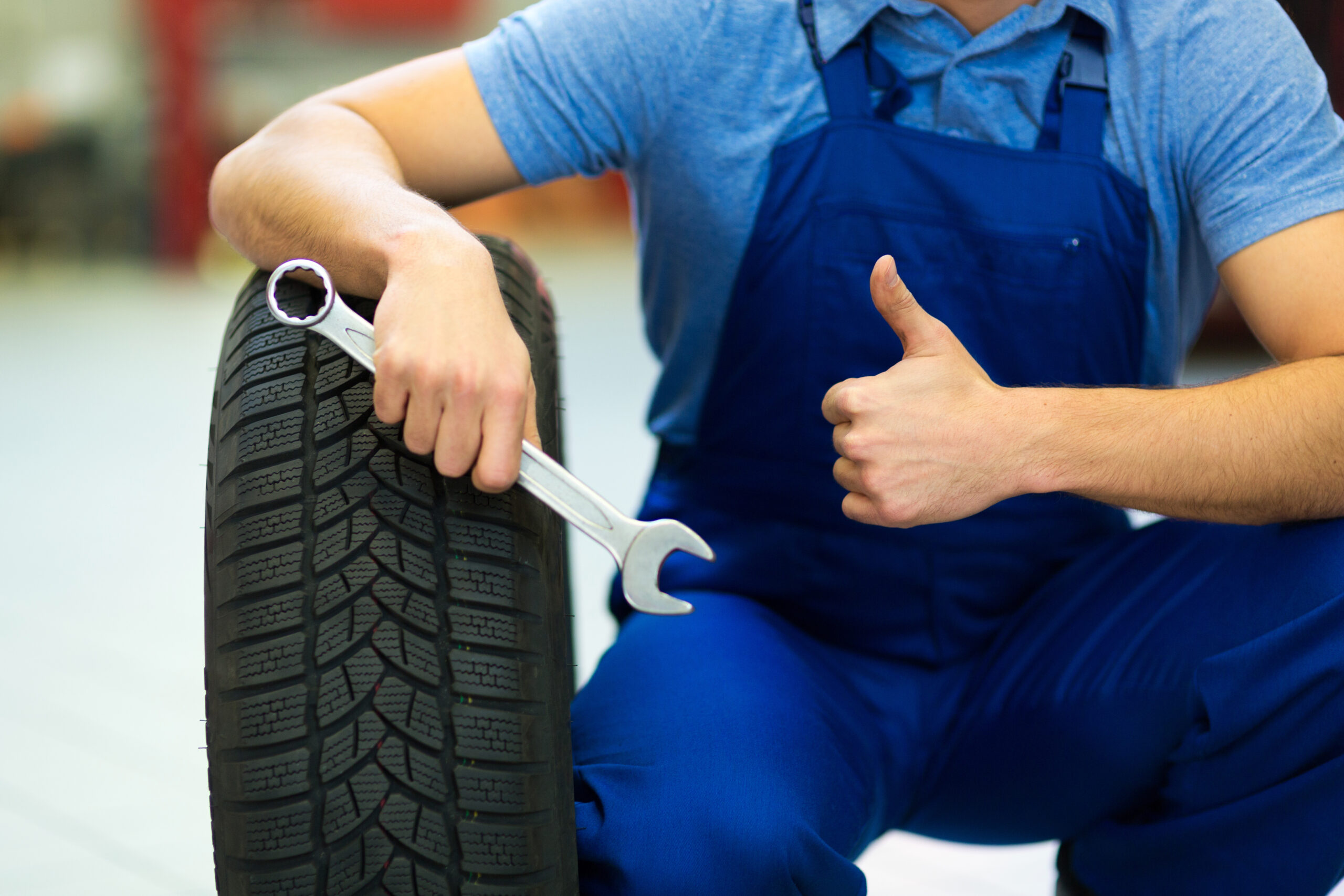 Car mechanic in workshop